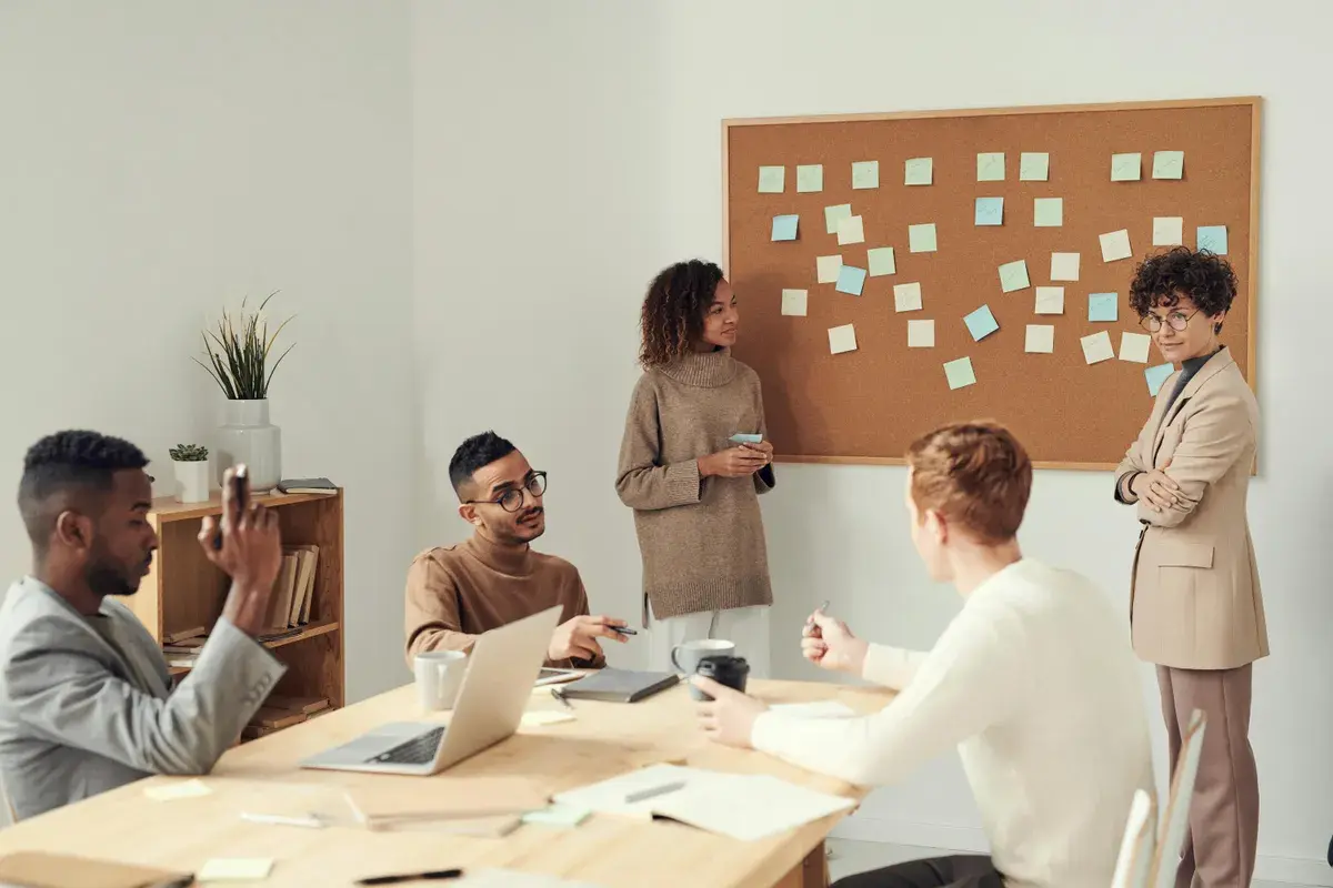 Brokers having a meeting about their success rates