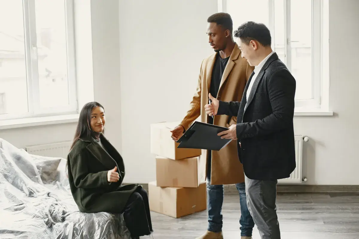 A broker guiding them about residential mortgages