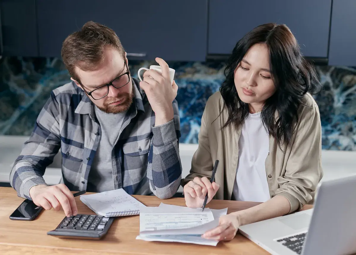 Couple checing their credit score